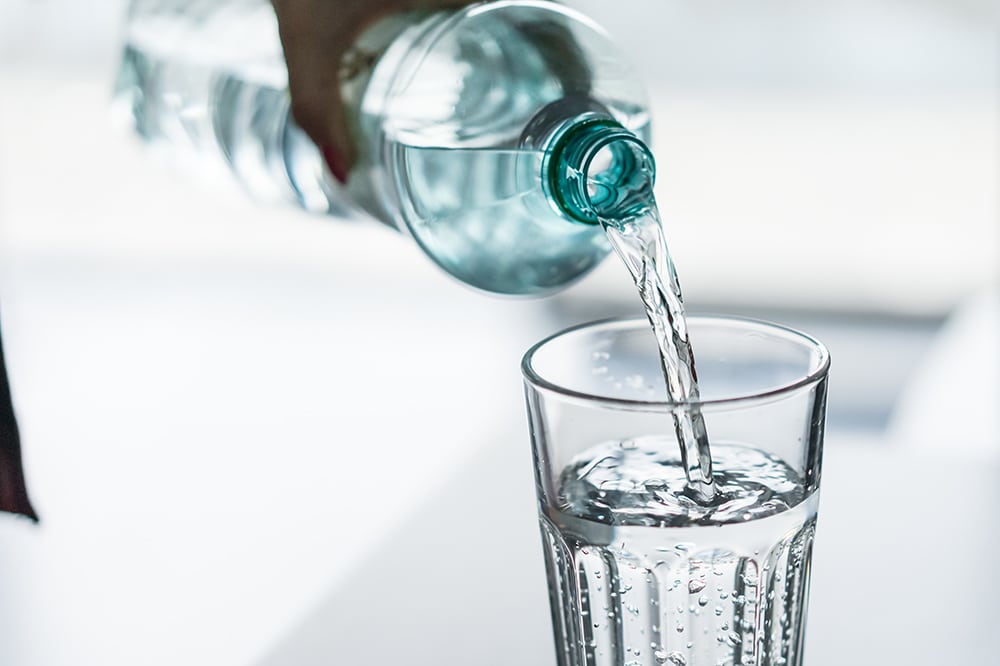 Water pouring into a glass